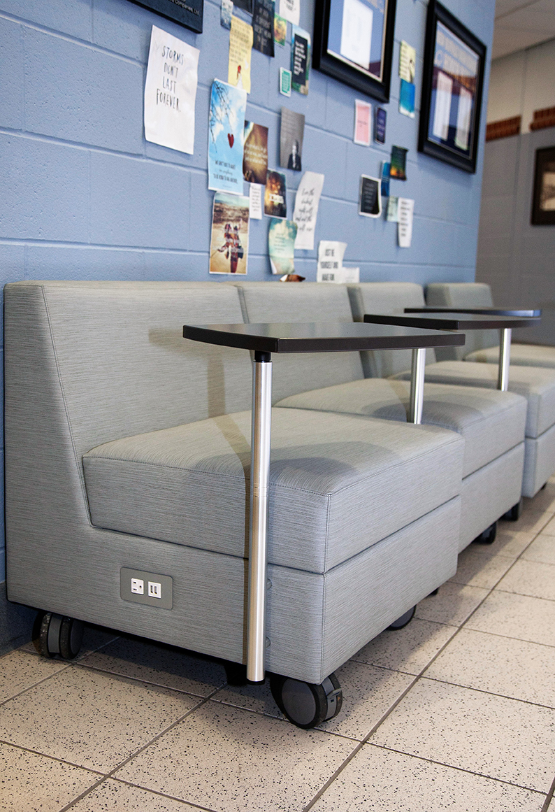 New Buffalo Schools loose furnishings grey lounge chairs with tablet arms